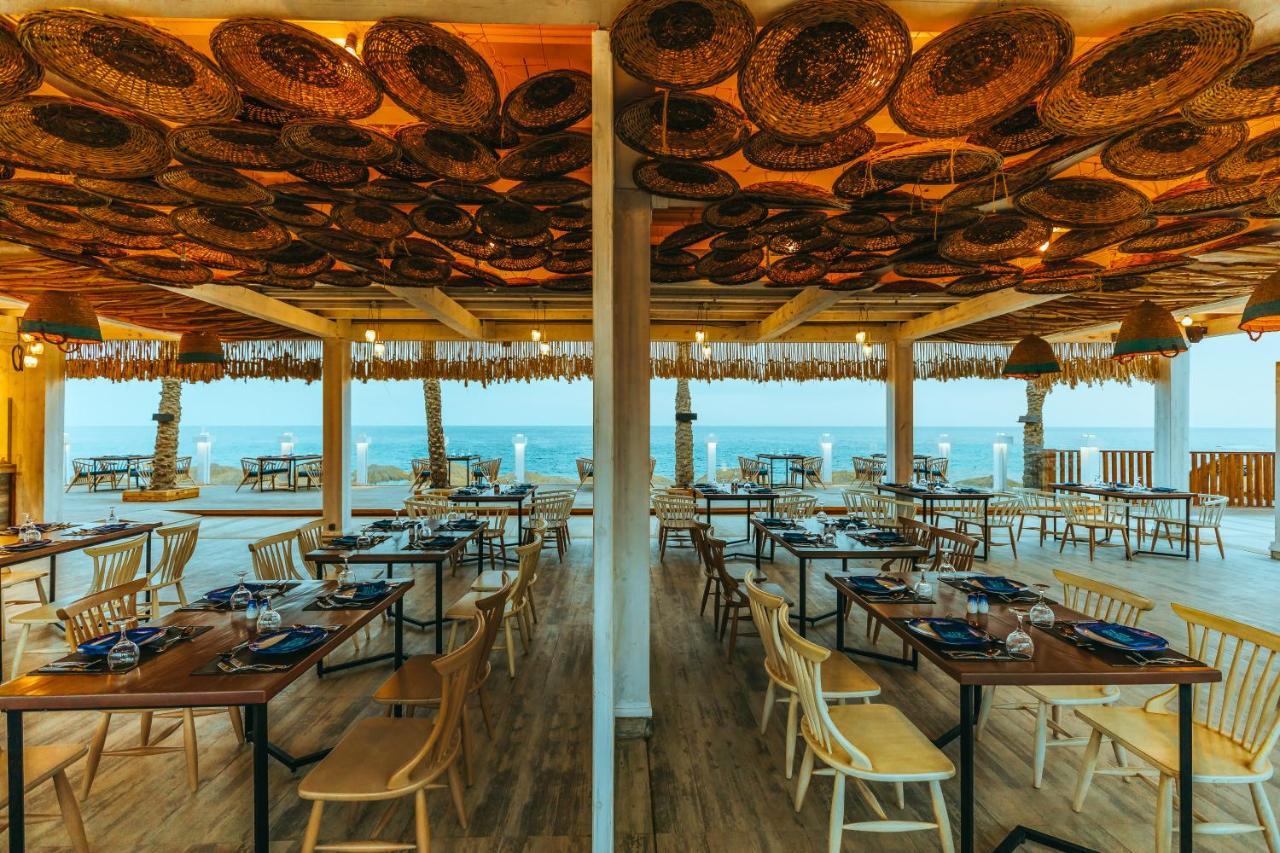 Sunrise Diamond Beach Resort -Grand Select Sharm el-Sheikh Exterior foto The restaurant at the top of the lighthouse
